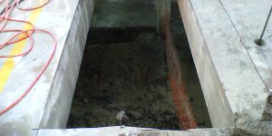 Abertura em laje de concreto em piso industrial